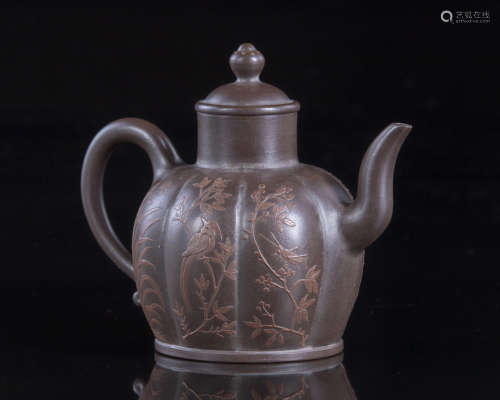 A Chinese dark brown Yixing teapot
