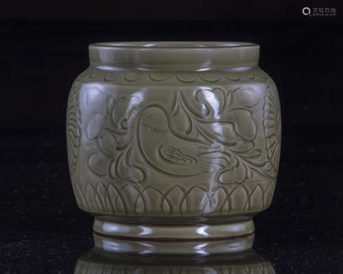 A Chinese celadon glazed jar