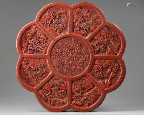 A large Chinese cinnabar lacquer floriform box and cover