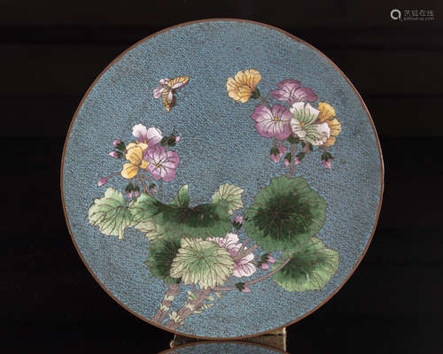 A Chinese cloisonné circular plaque