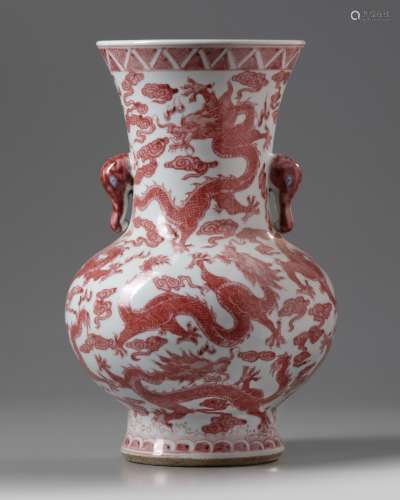 A Chinese iron red dragon vase