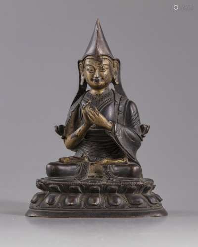 A Chinese gilt bronze figure of Lama