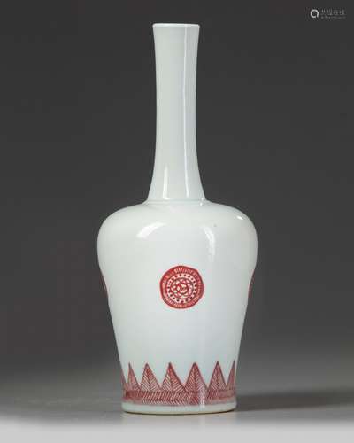 A Chinese iron-red bottle vase