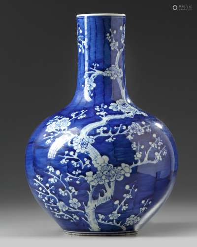 A Chinese blue and white cherry blossom vase