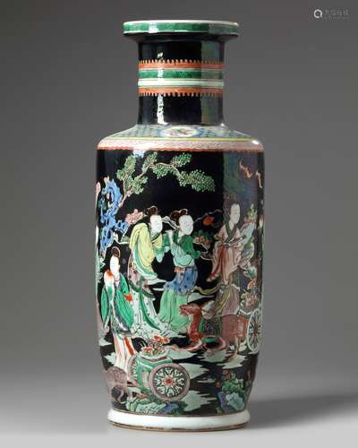 A Chinese famille noir 'Magu' rouleau vase