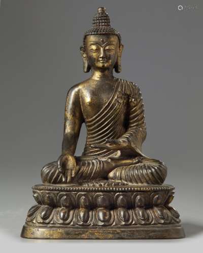 A Chinese bronze figure of buddha
