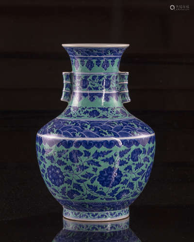 A Chinese gasoline green ground blue and white vase