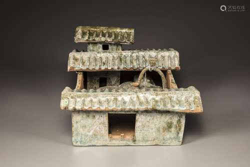 A Chinese green-glazed pottery grain mill