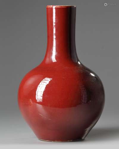 A Chinese red glazed bottle vase