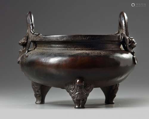 A Chinese bronze tripod censer