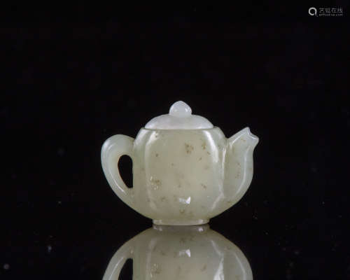 A Chinese jade miniature teapot. and cover