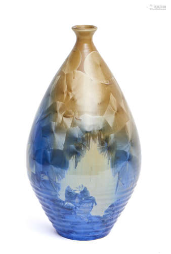 Tall vase with a narrow mouth decorated with metallic blue to brown patches