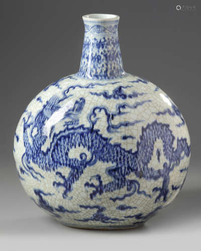 A Chinese blue and white dragon bottle vase