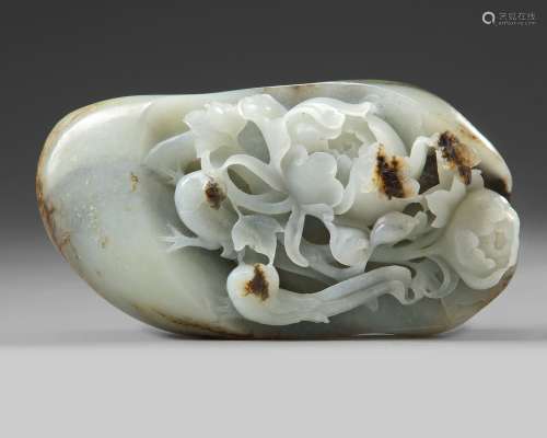 A Chinese white and russet jade 'pheasant and peony' pebble