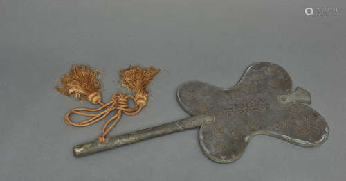 A metal butterfly-shaped battle-fan (gunbai)