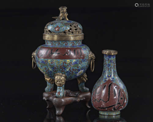A Chinese cloisonné censer on a wooden stand and a small vase
