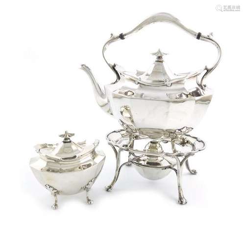 A Scottish silver kettle on stand and a tea caddy,…