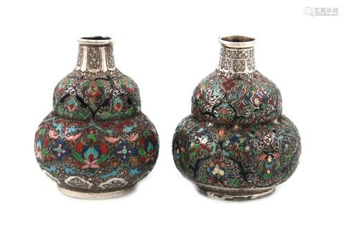 A pair of Middle Eastern metalware and enamel vase…