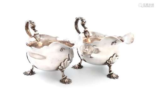 A matched pair of George II silver sauce boats, by…