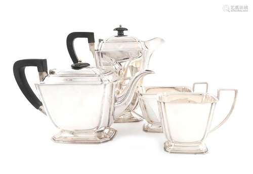 A matched four piece silver tea set, by Henry Atki…