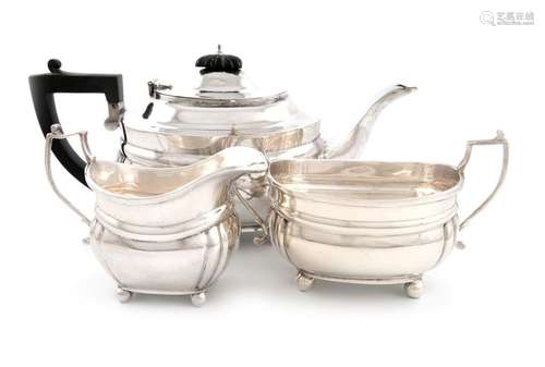 A three piece silver tea set, by Charles Stuart Ha…