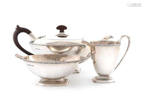 A three piece Art Deco silver tea set, by The Adie…