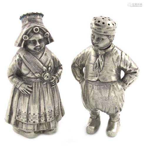 A pair of German novelty silver Dutch boy and girl…