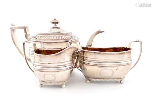 Λ A three piece George III silver tea set, by Urqu…