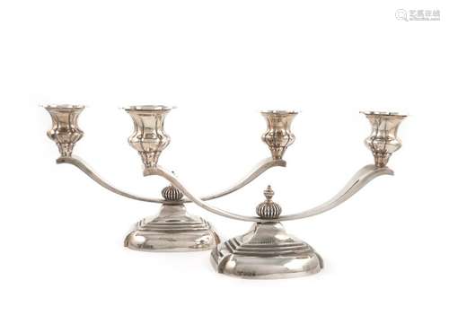 A pair of silver two light candelabra, by Garrard …