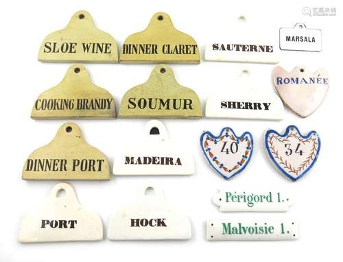 A collection of ceramic bin labels, various dates …