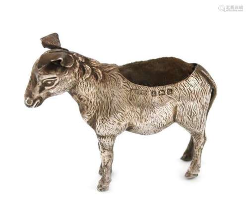 An Edwardian novelty silver donkey pin cushion, by…