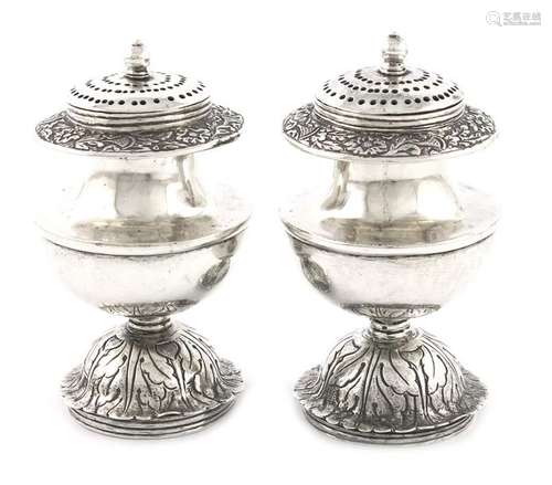 A pair of 19th century silver pepper pots, unmarke…