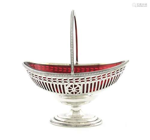 An Edwardian silver swing handled sugar basket, by…