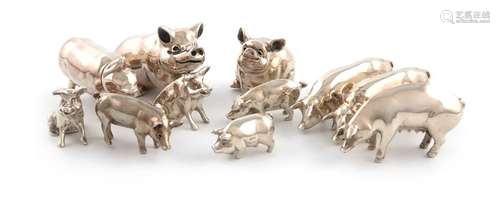 A collection of eleven modern silver pigs, some It…