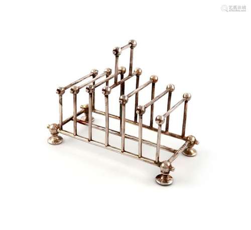 A late Victorian silver seven bar toast rack, by W…