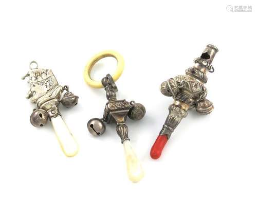 Λ A small collection of three silver baby's rattle…