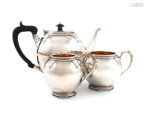 A matched three piece Art Deco silver tea set, by …