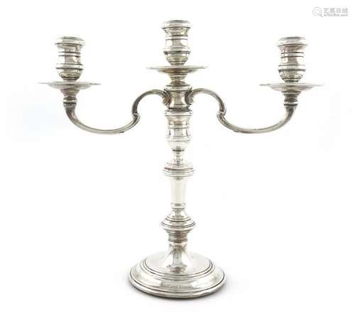 A modern silver three light candelabrum, by R. Com…