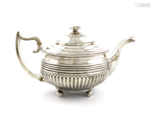 Λ A George III silver teapot, by Solomon Hougham, …