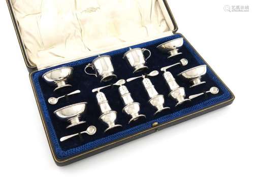 A ten piece silver condiment set, by Stokes and Ir…