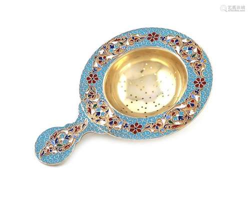 A Russian silver gilt and enamel tea strainer, 189…