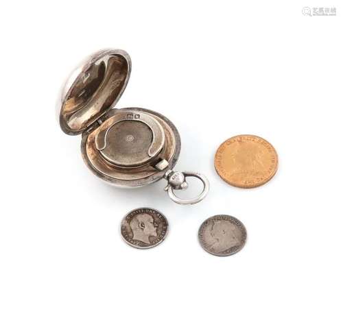 A silver sovereign case and gold sovereign, by the…