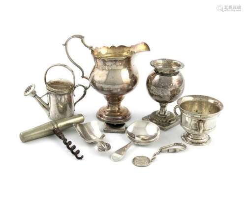 A mixed lot, comprising silver items: a cream jug,…