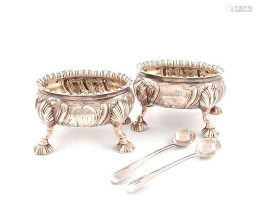 A pair of George III silver salt cellars, by David…