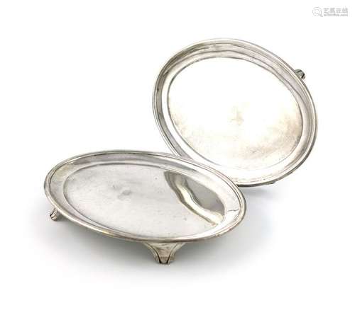 A pair of George III silver teapot stands, by Solo…