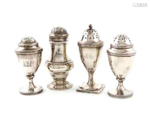 A small collection of four George III silver peppe…