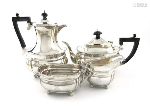 A matched four piece silver tea set, by Thomas Edw…