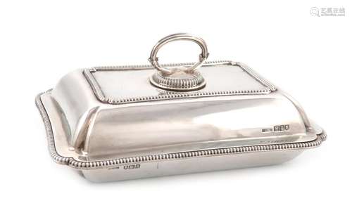 A silver entrée dish and cover, by Asprey and Co, …