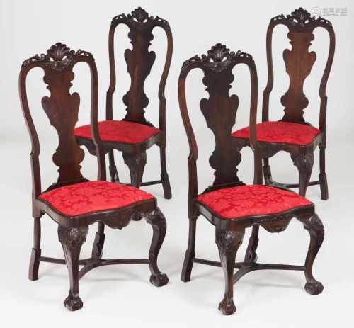 A set of four D.José style chairsRosewoodPierced backs and scalloped splatsClaw and ball