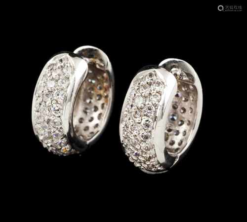 A pair of earringsGoldFront and reverse brilliant cut diamond pave set rings, totaling (ca.1.80ct)